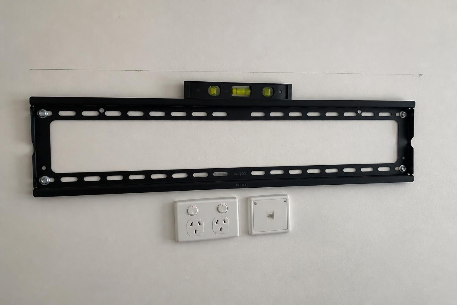 Power point and data point fitted behind the TV bracket